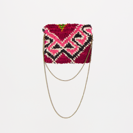 Handgemaakte Oasis tas, gemaakt van kleurrijke vintage Boujaad-kleden van 100% schapenwol uit Marokko, met unieke patronen en kleuren.
