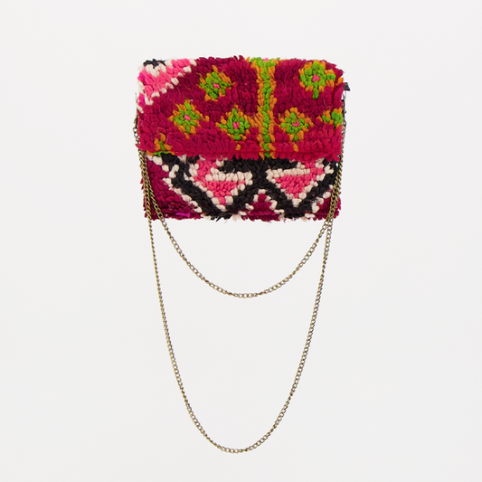 Handgemaakte Oasis tas, gemaakt van kleurrijke vintage Boujaad-kleden van 100% schapenwol uit Marokko, met unieke patronen en kleuren.