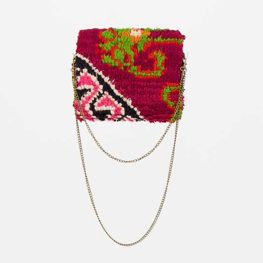 Handgemaakte Oasis tas, gemaakt van kleurrijke vintage Boujaad-kleden van 100% schapenwol uit Marokko, met unieke patronen en kleuren.