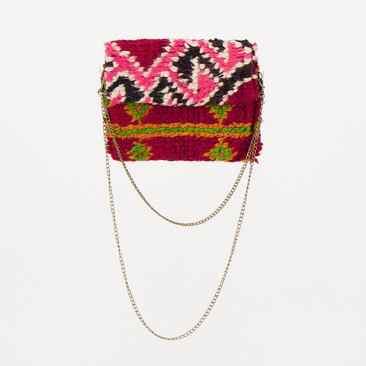 Handgemaakte Oasis tas, gemaakt van kleurrijke vintage Boujaad-kleden van 100% schapenwol uit Marokko, met unieke patronen en kleuren.