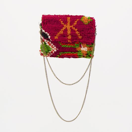Handgemaakte Oasis tas, gemaakt van kleurrijke vintage Boujaad-kleden van 100% schapenwol uit Marokko, met unieke patronen en kleuren.