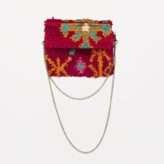 Handgemaakte Oasis tas, gemaakt van kleurrijke vintage Boujaad-kleden van 100% schapenwol uit Marokko, met unieke patronen en kleuren.