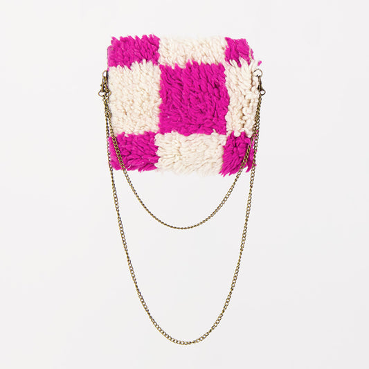 Handgemaakte Pink Nomad tas met roze-wit geblokt patroon, gemaakt van checkered kleden.