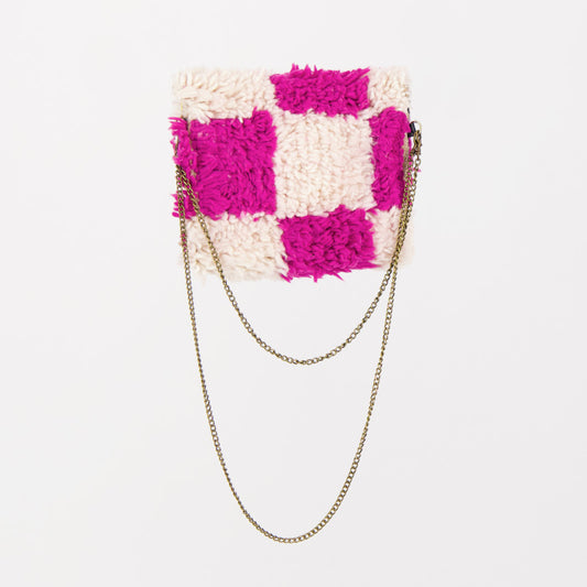 Handgemaakte Pink Nomad tas met roze-wit geblokt patroon, gemaakt van checkered kleden.