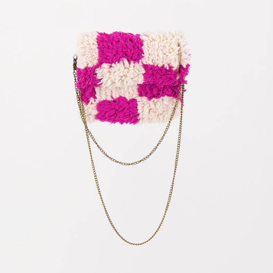 Handgemaakte Pink Nomad tas met roze-wit geblokt patroon, gemaakt van checkered kleden.
