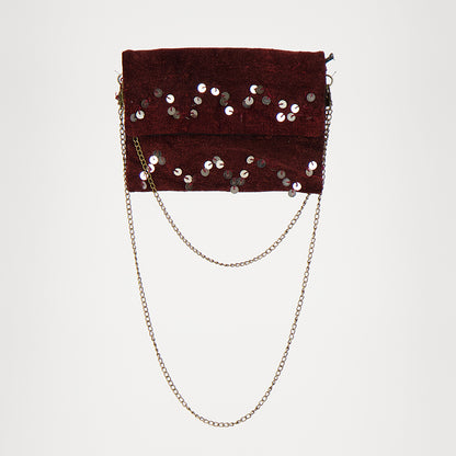 Handgemaakte Bordeauxrode Adora Ruby tas met lovertjes, gemaakt van een traditionele Marokkaanse handira kleed.